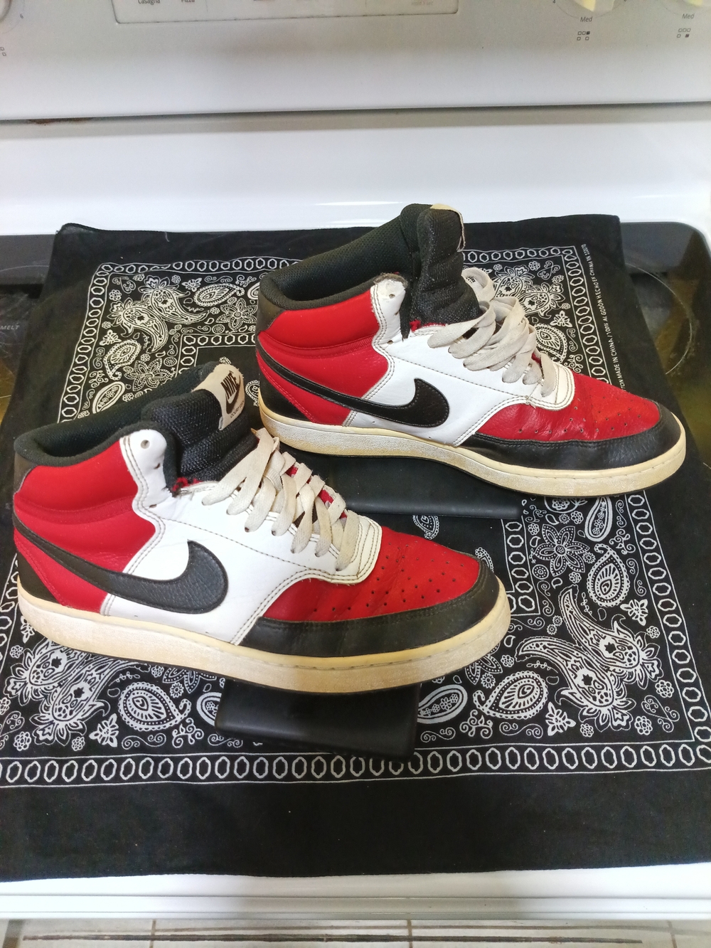 Nike High-Top Sneakers in Red, White, and Black